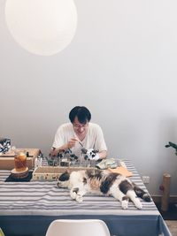 Portrait of young woman with dog