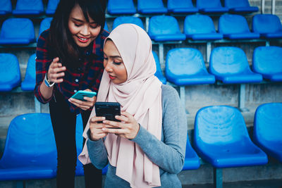 Young woman using mobile phone