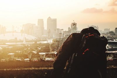 Woman looking at cityscape