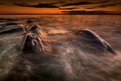 Scenic view of sea during sunset