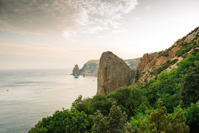 Scenic view of bay against sky