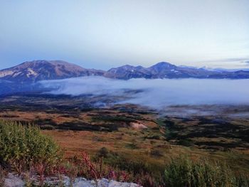 Scenic view of snowcapped mountains against sky