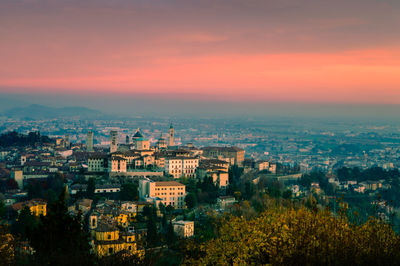 High angle view of cityscape against sky during sunset