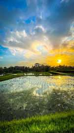 Scenic view of sea against sky during sunset