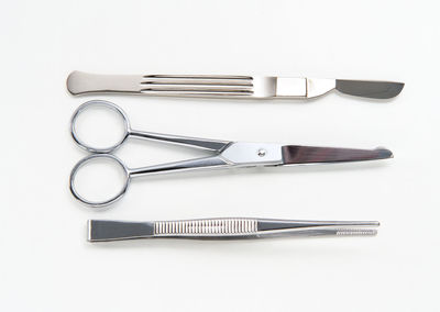 High angle view of objects on table against white background