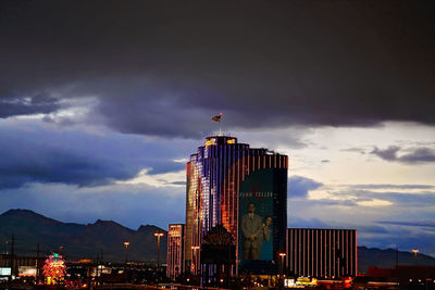 View of city buildings at dusk