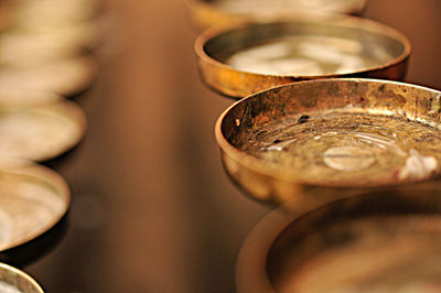 Close-up of coins on table