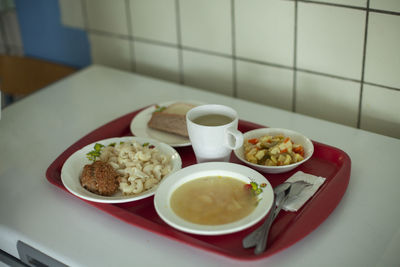 Food in the dining room. lunch on a tray. regular school meals. meals for schoolchildren in russia. 
