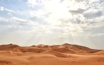 Scenic view of desert against sky