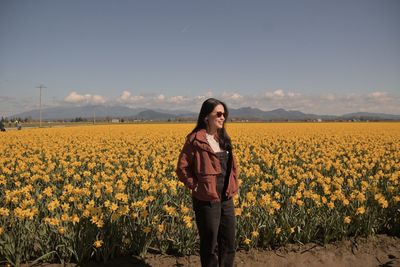Scenic view of oilseed rape field against sky