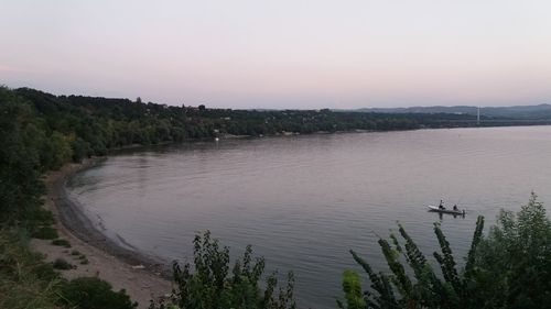 Scenic view of river against clear sky