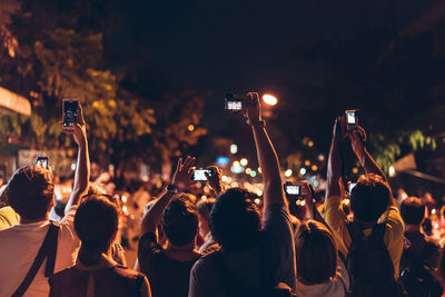 Crowd at music concert at night