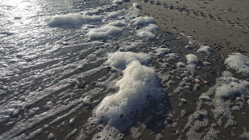 High angle view of snow on beach