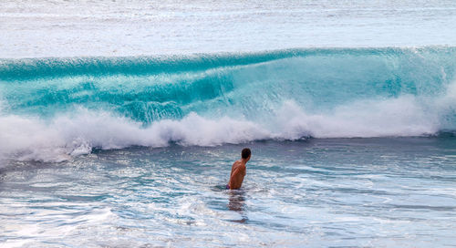 View of a man swimming in the sea