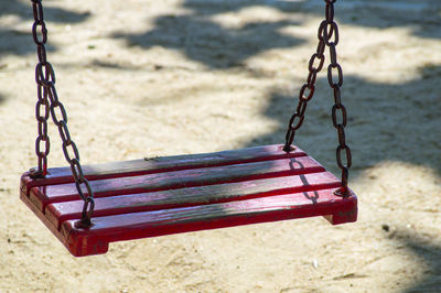 Close-up of empty swing in playground