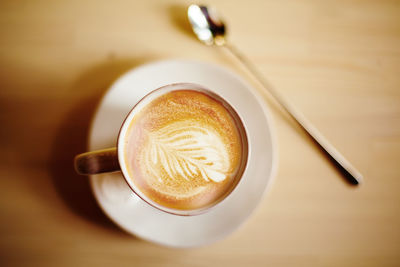 Directly above shot of cappuccino on table