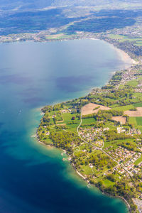 High angle view of sea by road against sky
