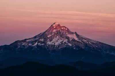 Scenic view of mountains against dramatic sky