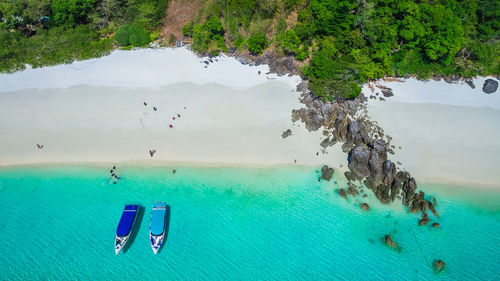 High angle view of people on sea shore