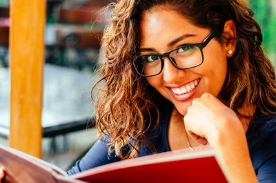 Portrait of smiling young woman