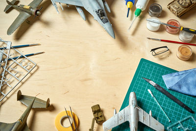 High angle view of toy with paintbrush on table