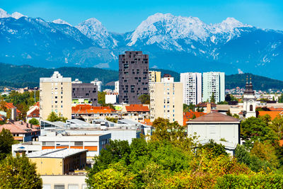 Buildings in city against sky