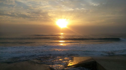 Scenic view of sea during sunset