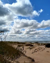 Scenic view of beach against sky