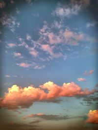 Low angle view of cloudy sky at sunset