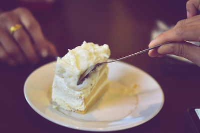 Midsection of person holding ice cream