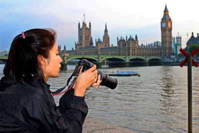 Tourists on riverbank