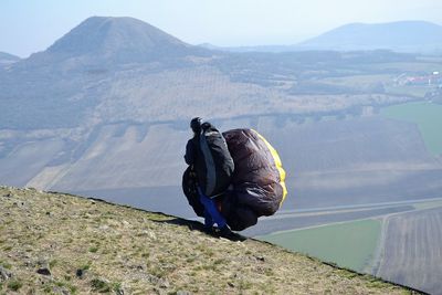 Man on the top of the mountain