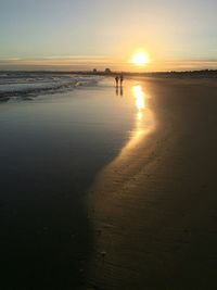 Scenic view of sea at sunset