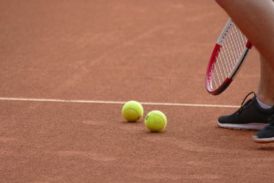 Low section of man with ball