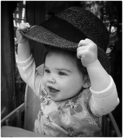 Close-up of cute girl in hat