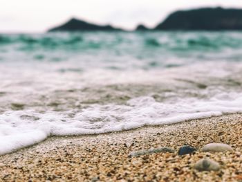 Close-up of pebbles on beach