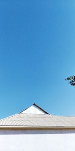 Low angle view of building against blue sky