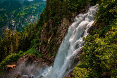 Scenic view of waterfall in forest