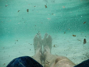 Reflection of woman in water