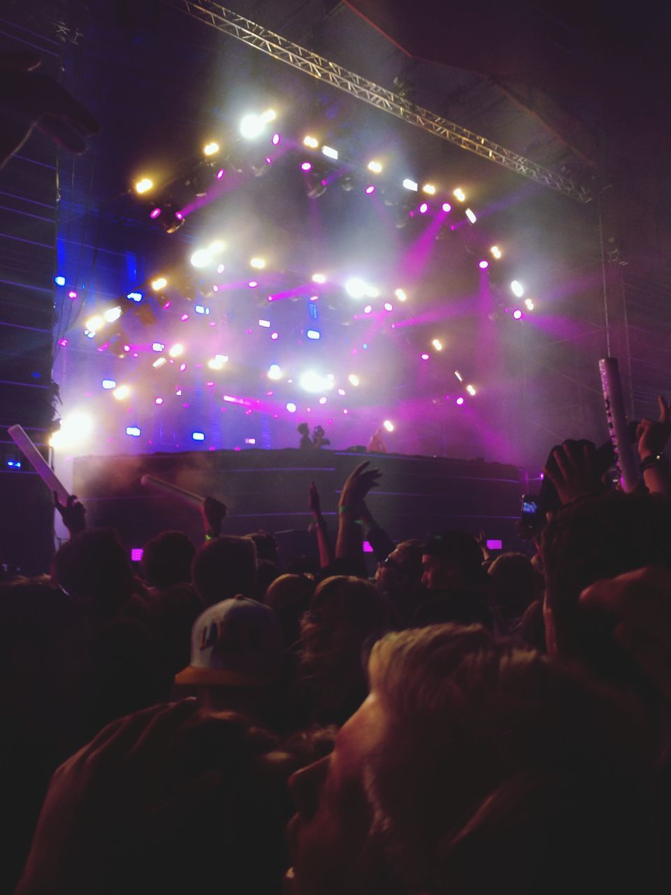 large group of people, illuminated, crowd, night, arts culture and entertainment, person, enjoyment, music, nightlife, event, lifestyles, men, performance, music festival, stage - performance space, concert, fun, leisure activity, popular music concert