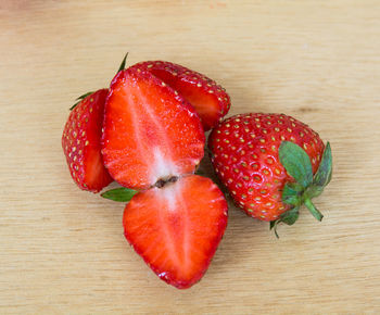 High angle view of strawberries on table