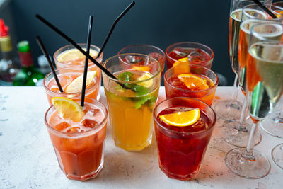 Set of cocktails and champagne in a glass on the bar table top made for party guests. 