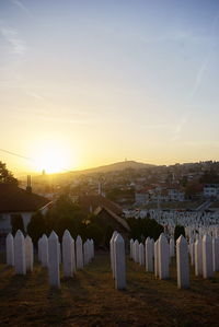 Panoramic shot of buildings against sky during sunset