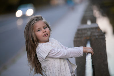 Beautiful little child girl walking in a park