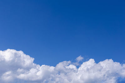 Low angle view of clouds in blue sky