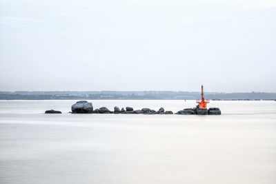 Scenic view of sea against clear sky