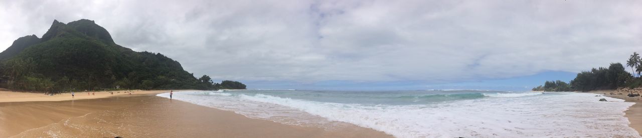 beach, sea, water, sand, shore, sky, horizon over water, scenics, beauty in nature, tranquil scene, tranquility, wave, surf, nature, cloud - sky, coastline, incidental people, idyllic, vacations, panoramic