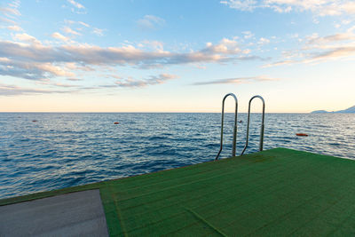 Sun loungers with awnings by the sea