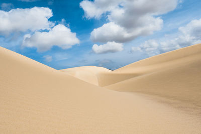 Scenic view of desert against sky