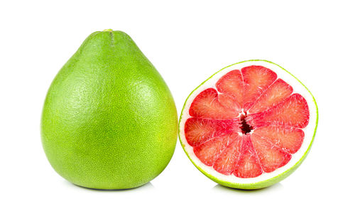 Close-up of fruits against white background